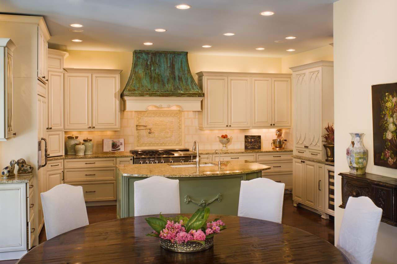View of a kitchen and dining area with cabinetry, countertop, cuisine classique, home, interior design, kitchen, living room, room, orange, brown, gray