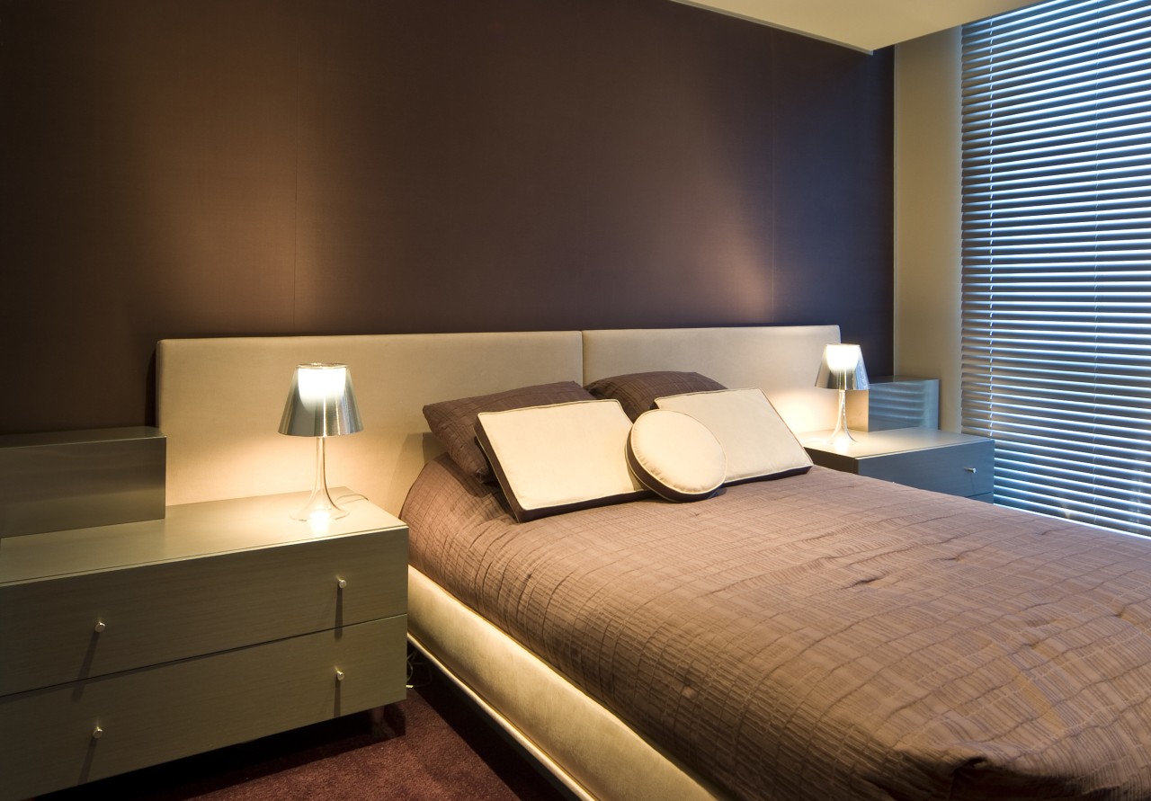 View of a bedroom at the Pececnik residence architecture, bed, bed frame, bedroom, ceiling, floor, interior design, lighting, room, suite, wall, brown