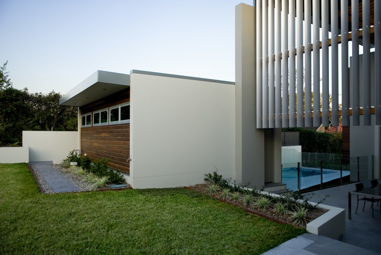 View of home with double height entrance, deck architecture, backyard, estate, facade, home, house, property, real estate, residential area, siding, yard, gray