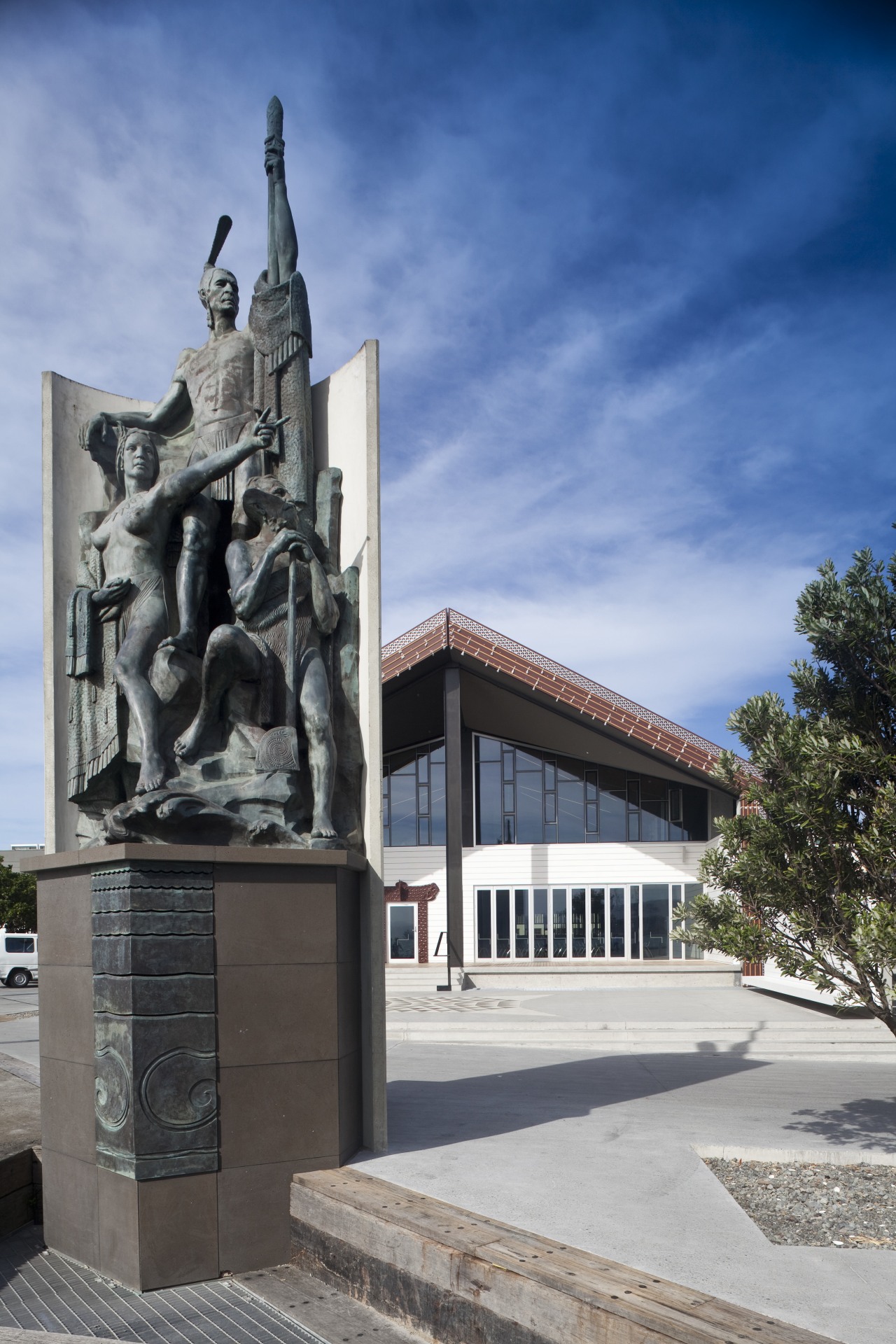 View of the Wharewaka building on the Wellington architecture, building, facade, landmark, memorial, monument, sky, statue, tourist attraction, gray, teal