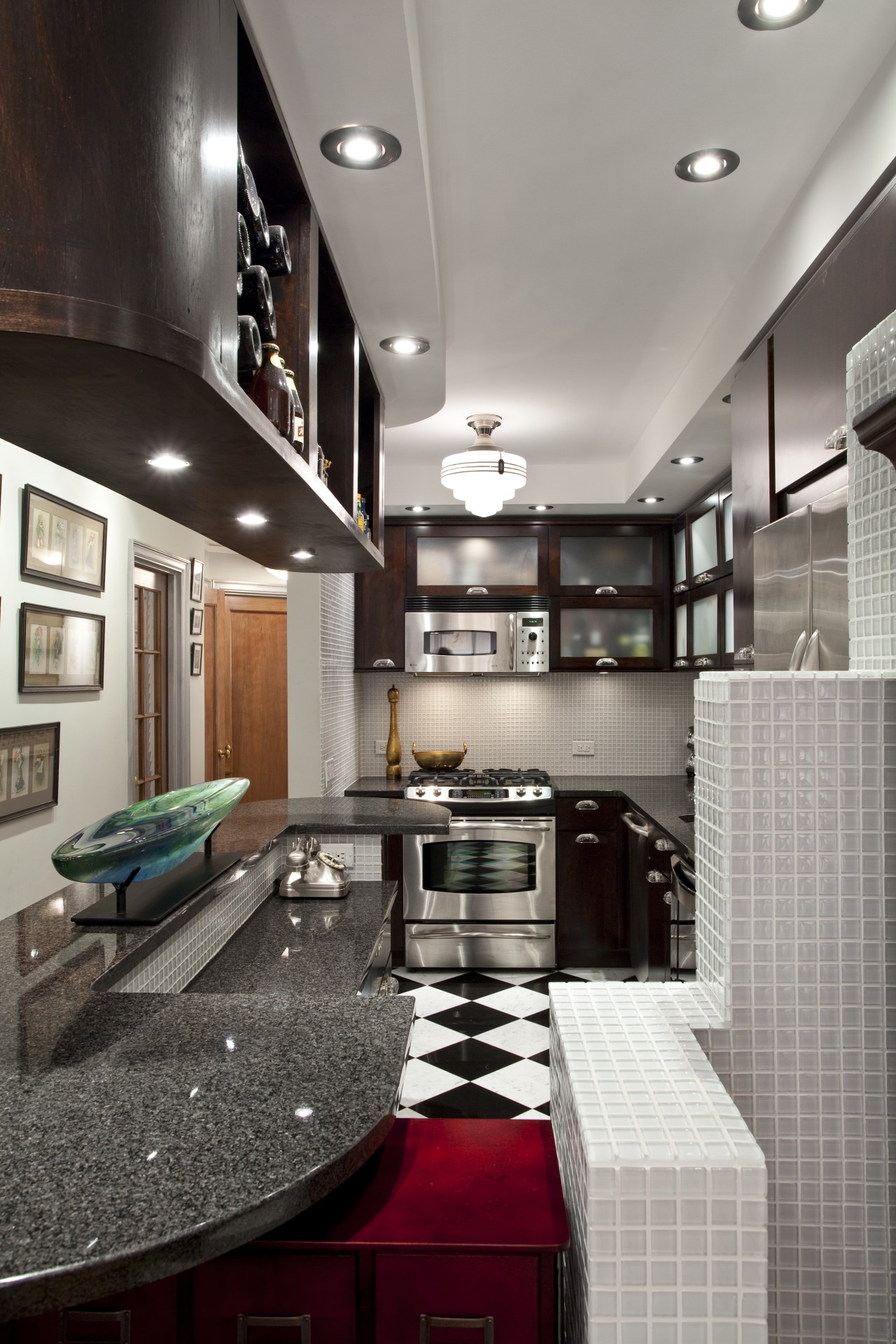 View of kitchen in Art-Deco styled apartment building, ceiling, countertop, home, interior design, kitchen, room, gray, black