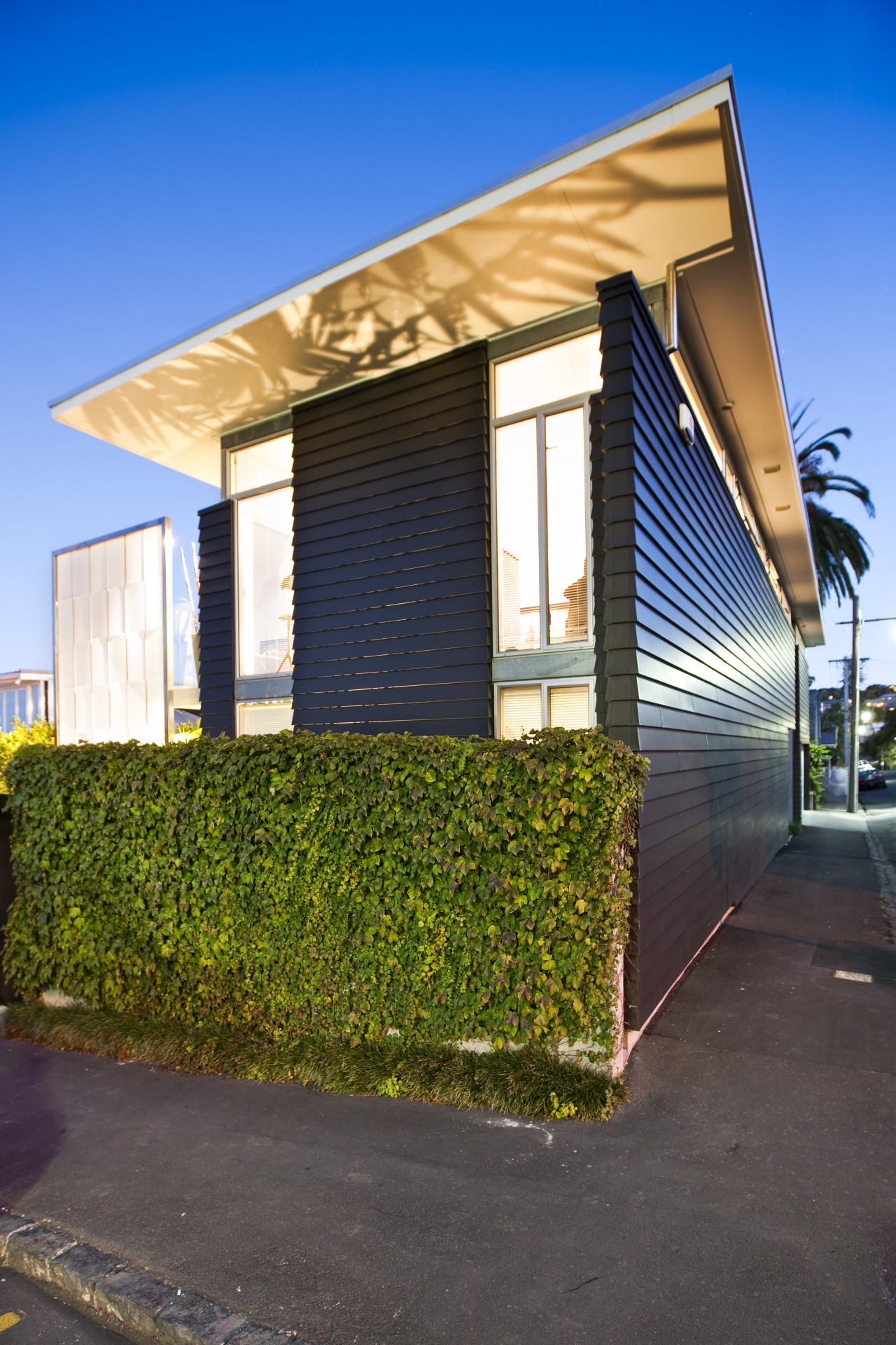 Exterior  view of renovated home with black architecture, building, facade, home, house, neighbourhood, property, real estate, residential area, sky