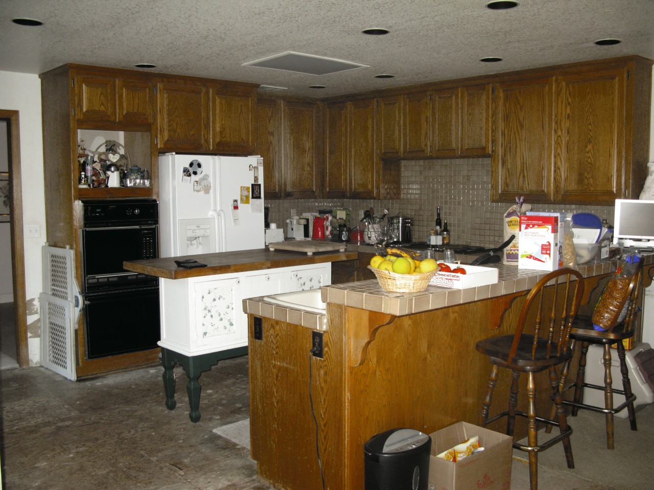 View of remodelled kitchen, with light-toned cabinetry and countertop, flooring, kitchen, room, brown