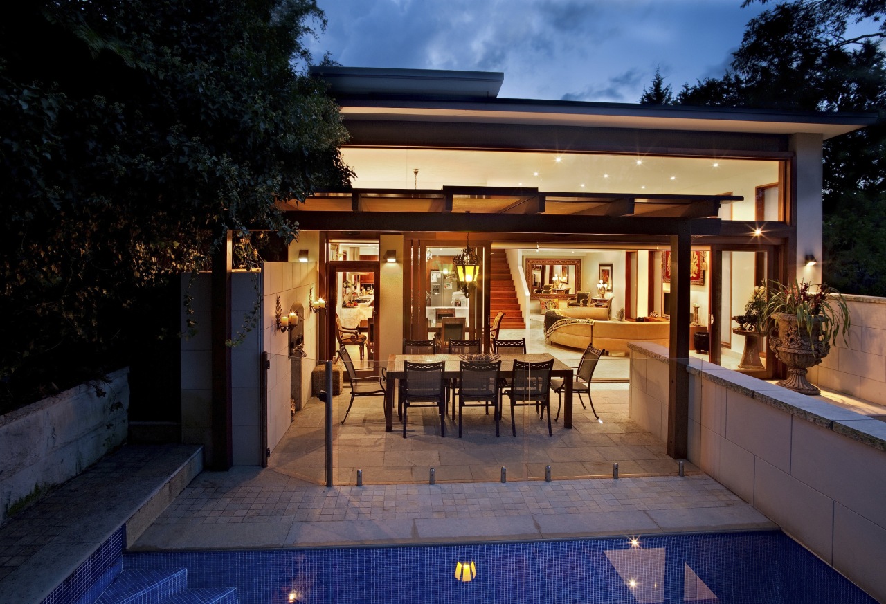 View of contemporary home with light-toned walls and backyard, estate, home, house, lighting, outdoor structure, property, real estate, villa, black