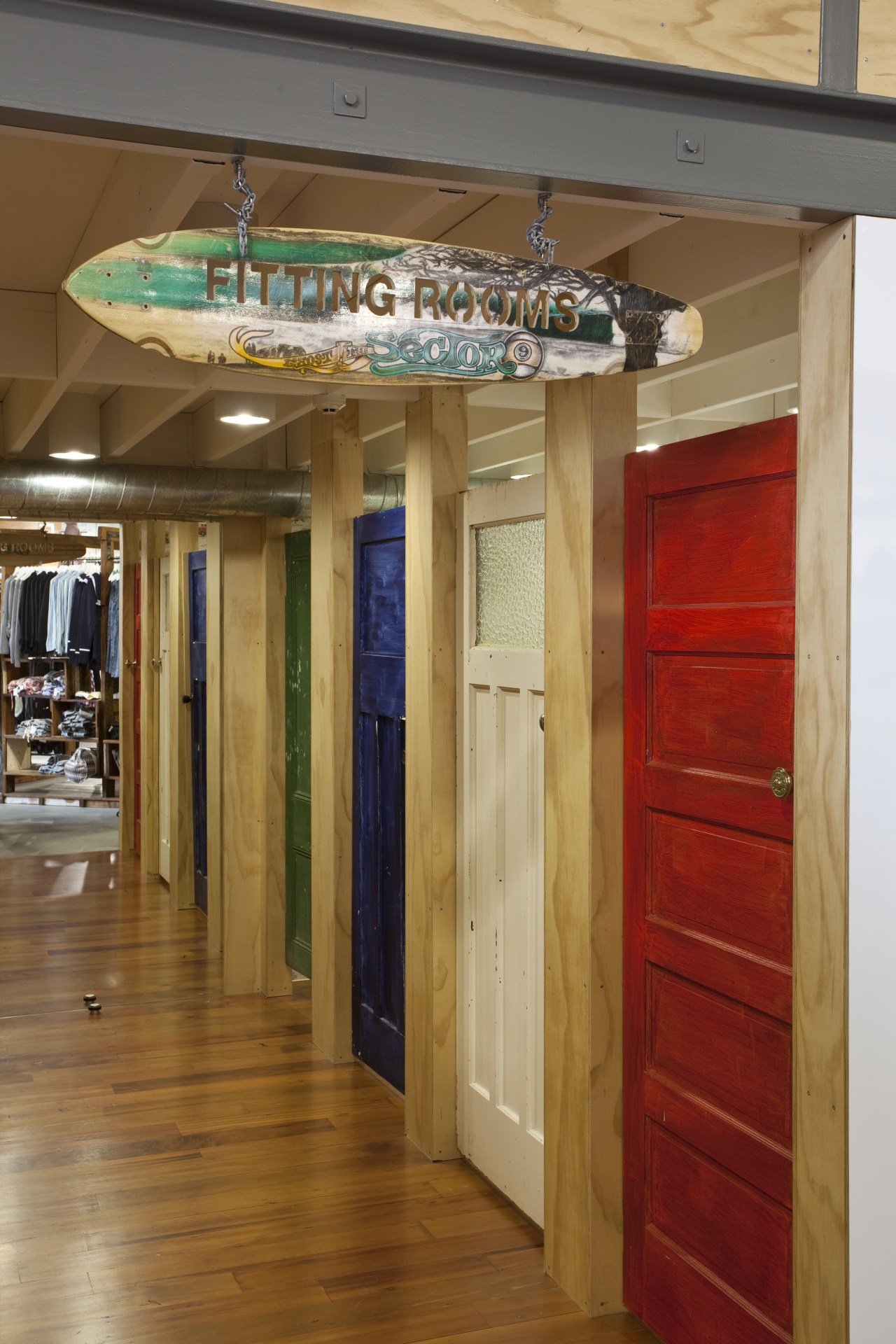 View of retail shop with interior and exterior ceiling, door, floor, flooring, interior design, wood, brown