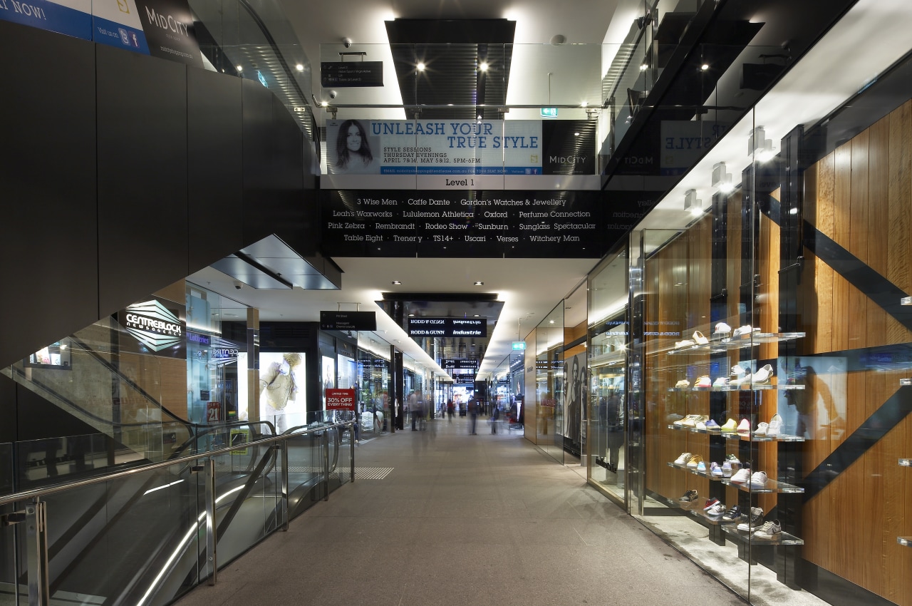 View of 420 George Street, featuring frameless vitrines building, shopping mall, black