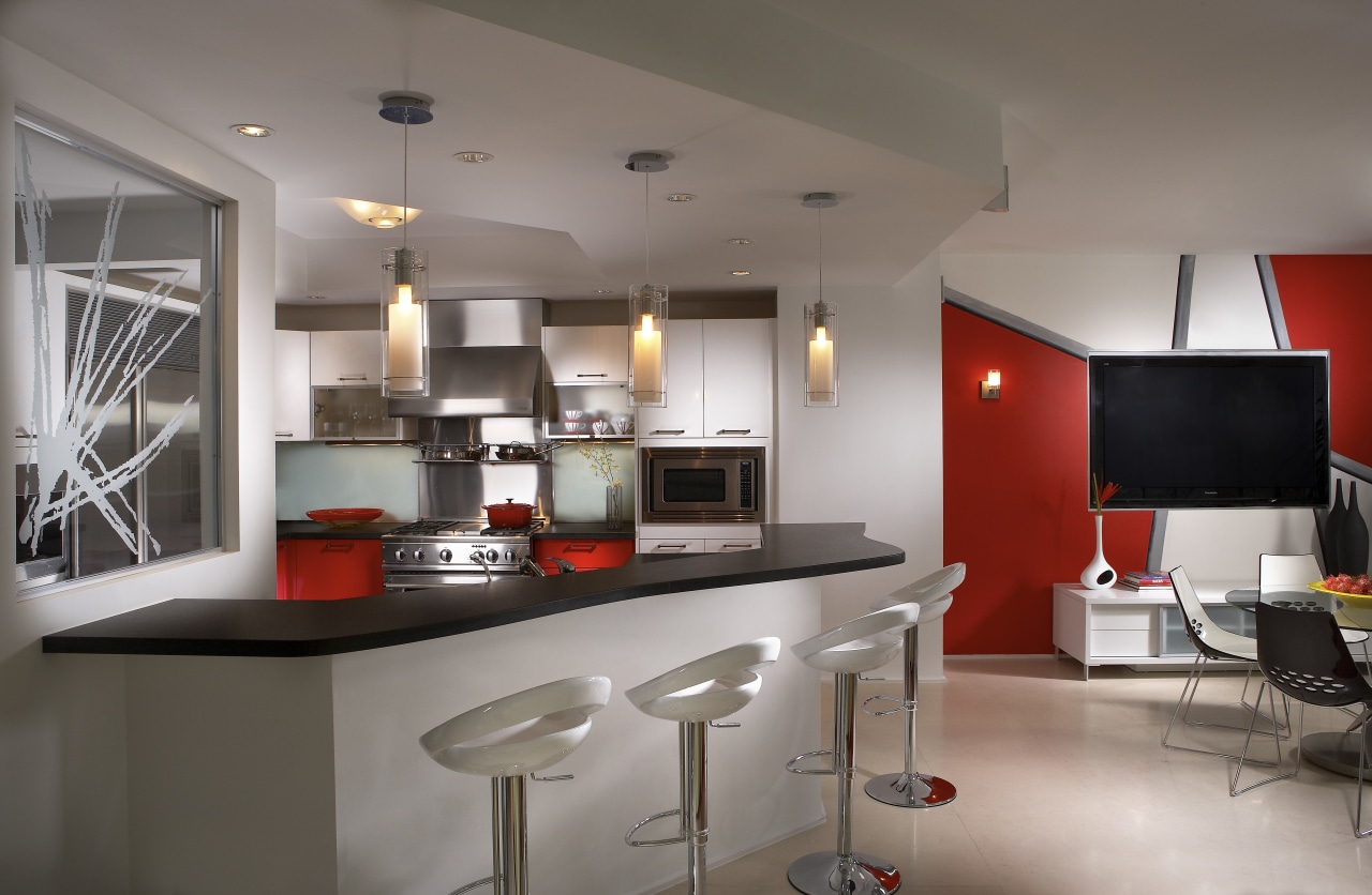Interior view of contemporary apartment with red feature countertop, interior design, kitchen, real estate, gray