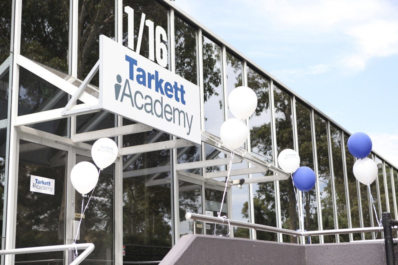 View of the Tarkett Academy building, structure, white, black