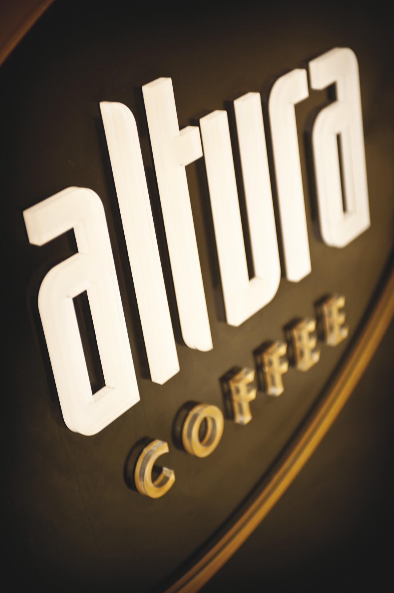 The Altura Coffee sign. brand, font, logo, text, black