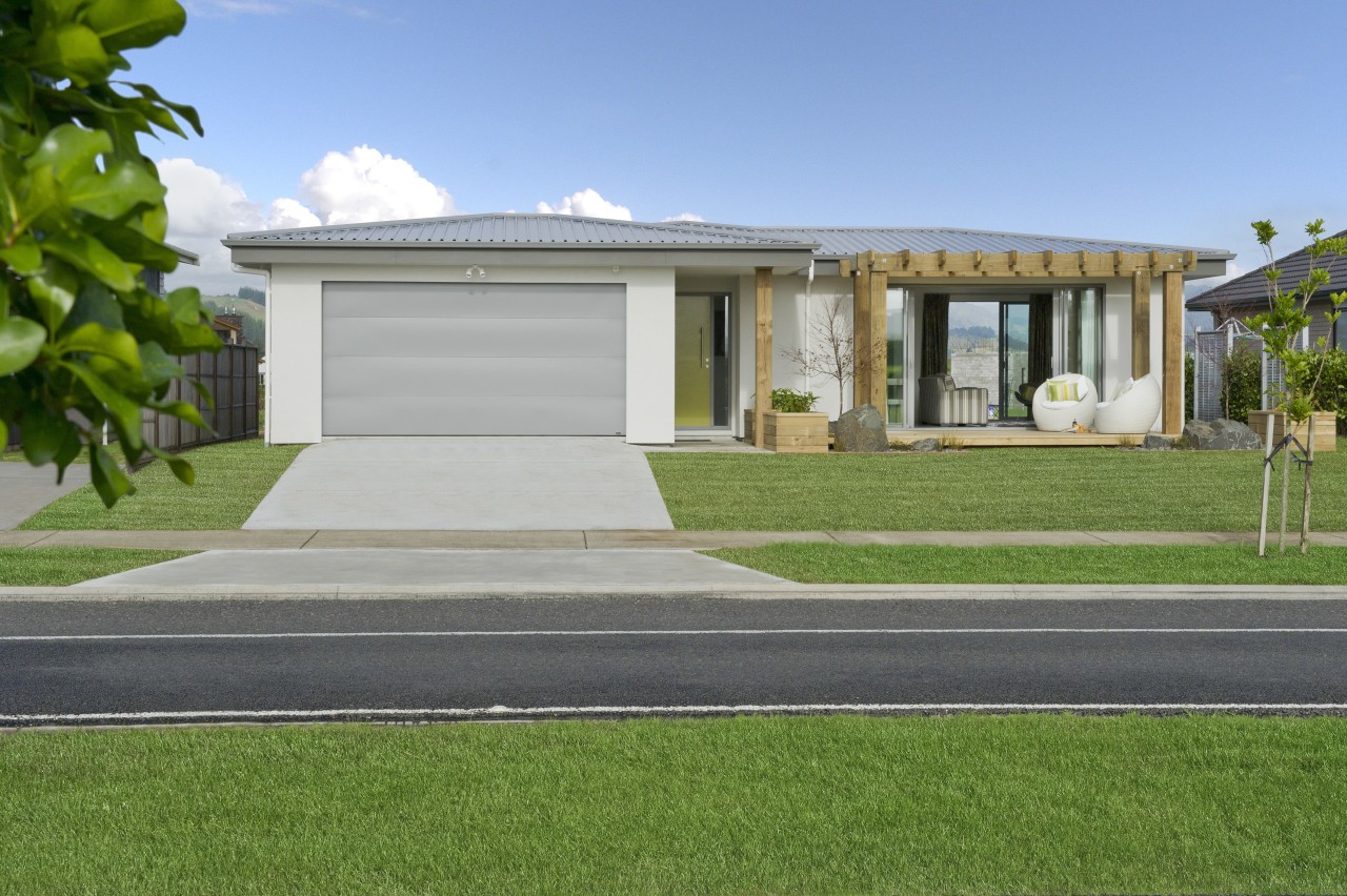 Yellow Fox designers have created a house in architecture, elevation, estate, facade, grass, home, house, landscape, property, real estate, residential area, villa, gray, green