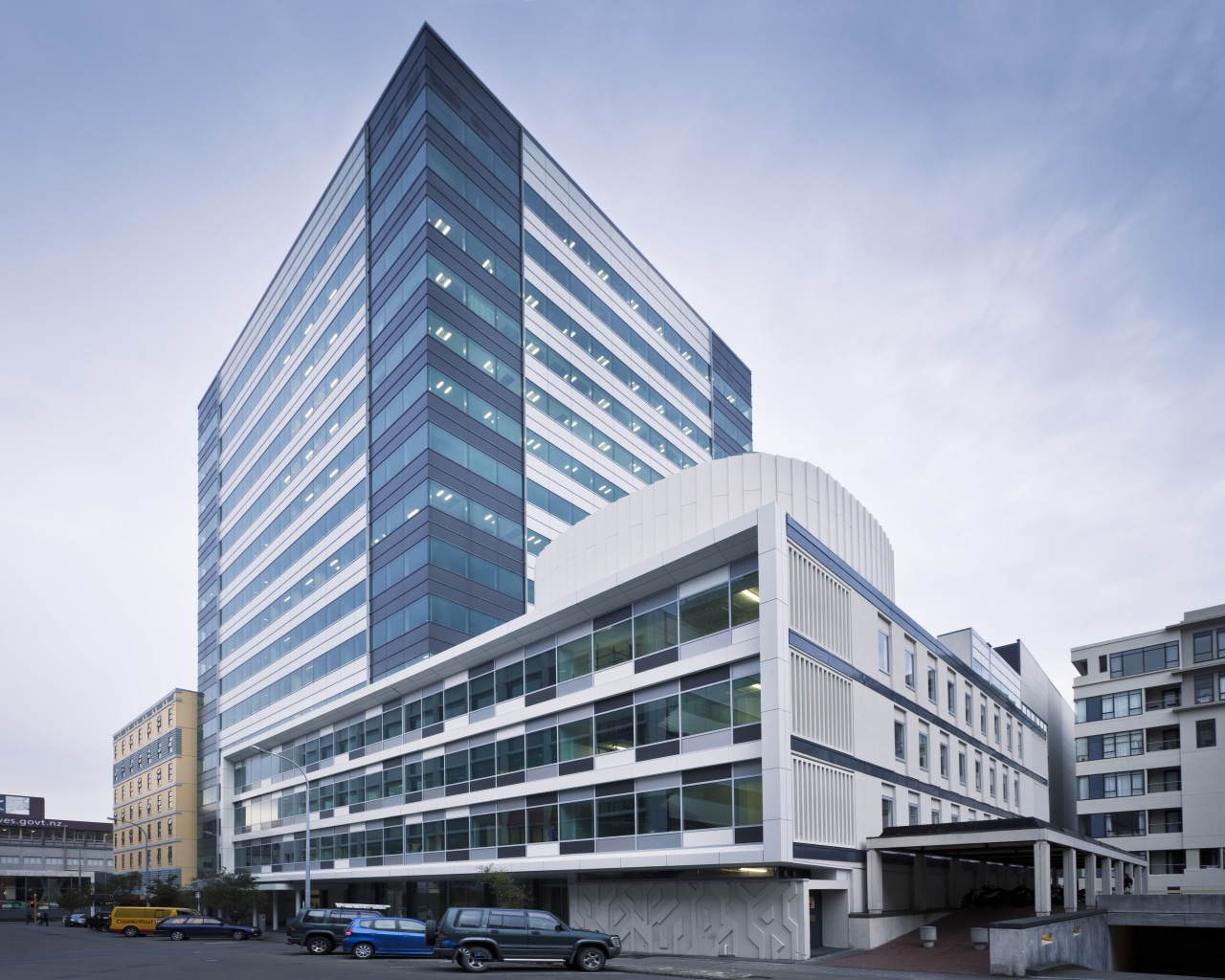 The Vogel building in Wellington's parliamentary district, refurbished apartment, architecture, building, commercial building, condominium, corporate headquarters, daytime, facade, headquarters, metropolis, metropolitan area, mixed use, real estate, sky, skyscraper, tower block, urban design, white