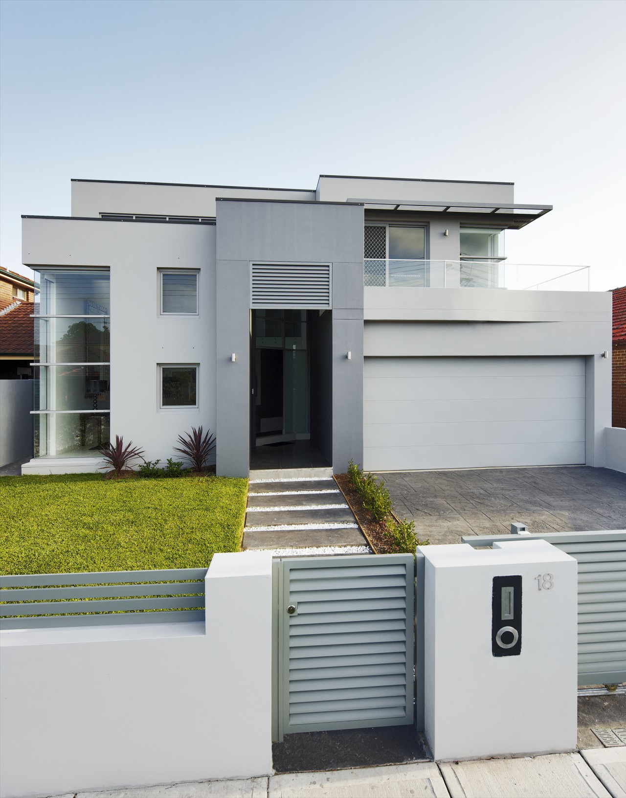 View of house from roadside. architecture, building, elevation, facade, home, house, property, real estate, residential area, white, gray