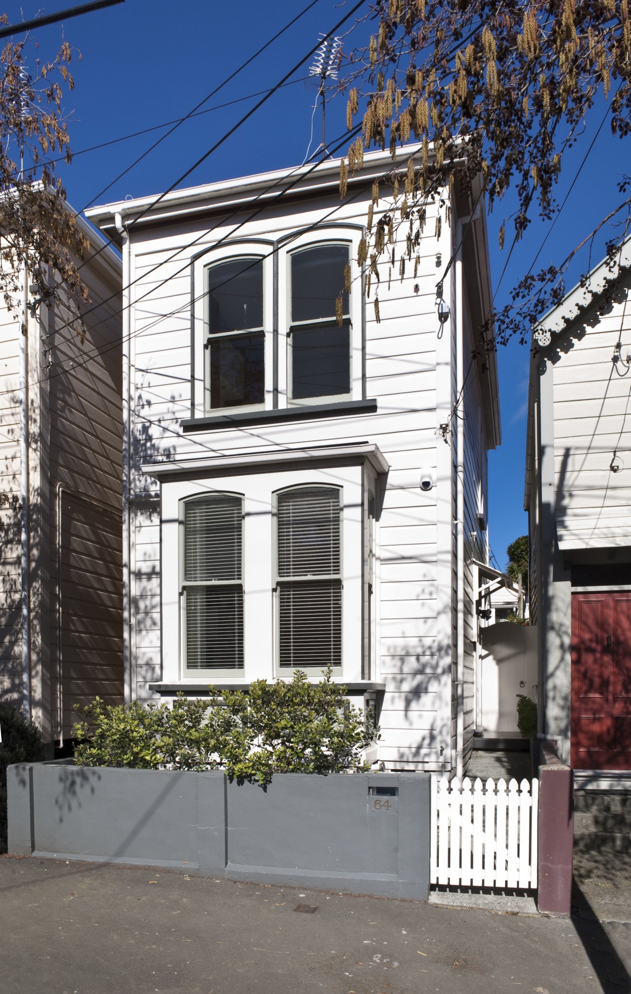 This home was renovated by Tse:Wallace Architects. Here architecture, building, cottage, facade, historic house, home, house, neighbourhood, property, real estate, residential area, siding, town, wall, window, gray