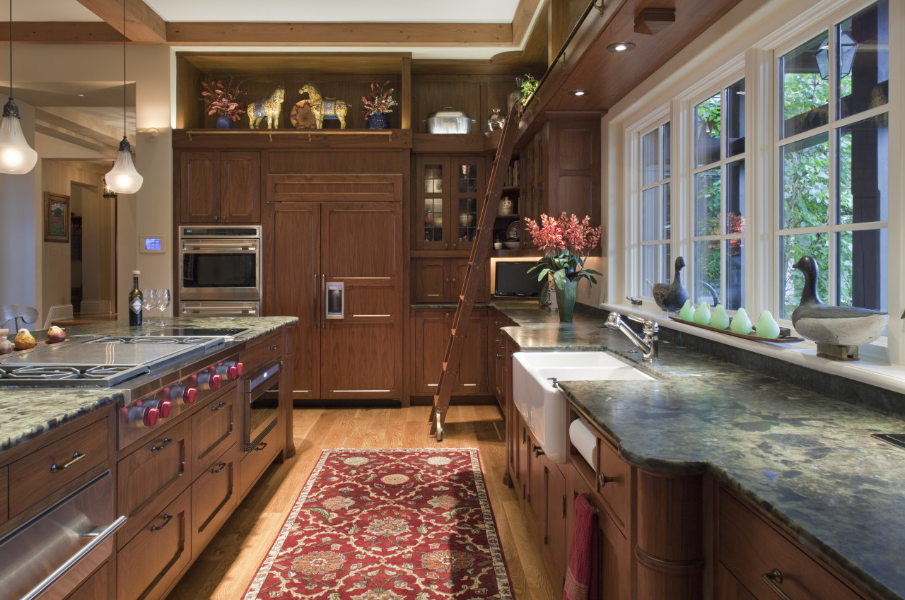View of kitchen with wooden cabinetry and red cabinetry, countertop, cuisine classique, estate, interior design, kitchen, room, brown