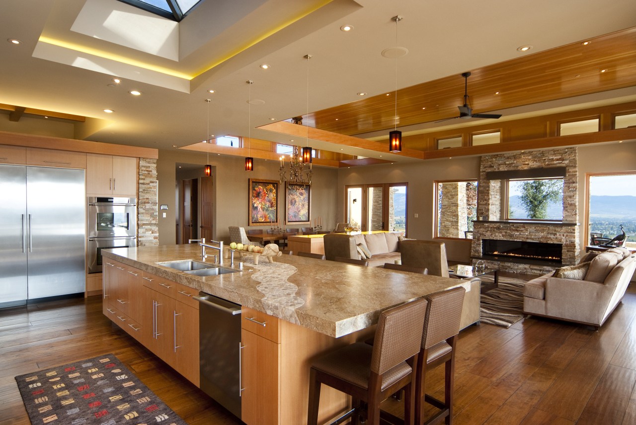 View of kitchen with wooden flooring, stone wall ceiling, countertop, dining room, hardwood, interior design, kitchen, living room, real estate, room, brown, orange