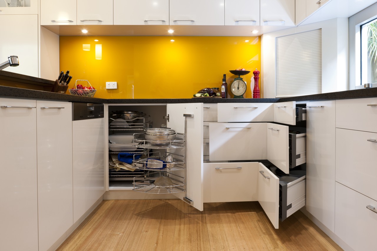 View of contemporary kitchen with yellow splashback and cabinetry, countertop, cuisine classique, floor, interior design, kitchen, room, gray