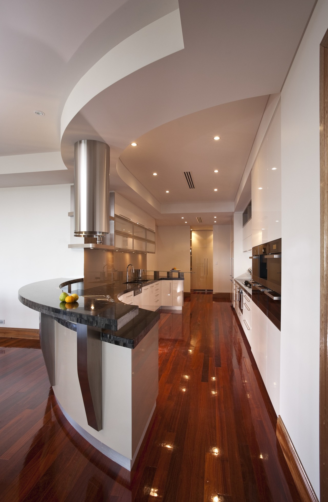 View of contemporary kitchen with wooden flooring and cabinetry, ceiling, countertop, floor, flooring, hardwood, interior design, kitchen, laminate flooring, real estate, room, wood flooring, red, gray