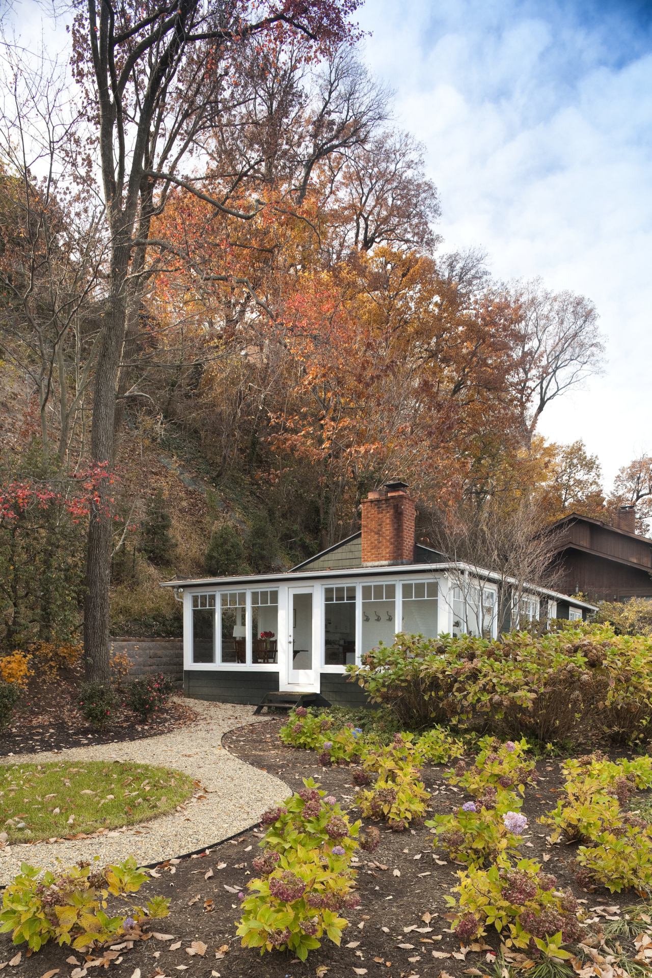Entrance leading up to home with white windowframes autumn, cottage, estate, garden, home, house, landscape, leaf, nature, plant, property, real estate, residential area, sky, spring, tree, brown