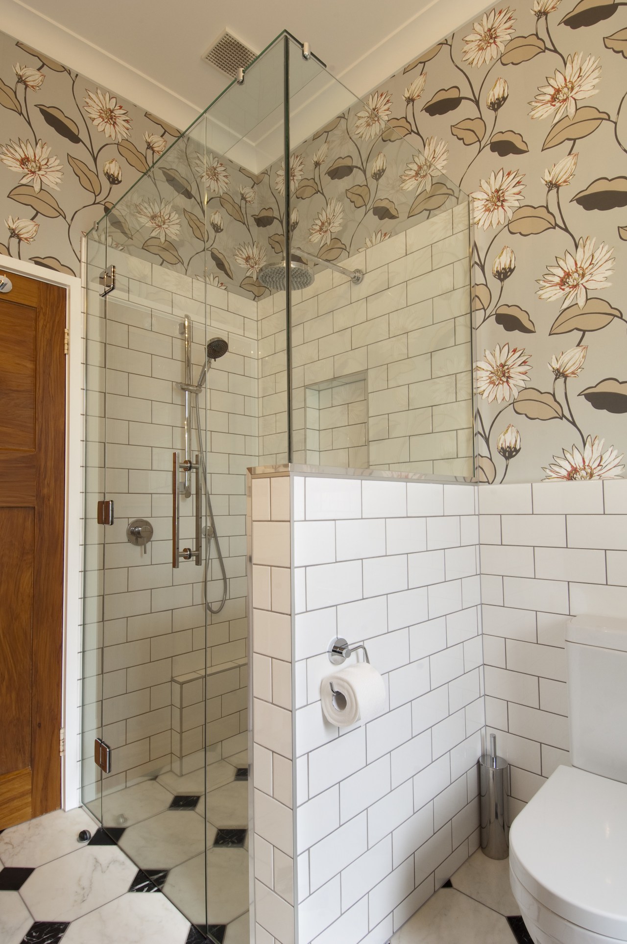 Bathroom shower enclosure with white brick wall and bathroom, ceiling, floor, flooring, home, interior design, plumbing fixture, room, tile, wall, gray, orange