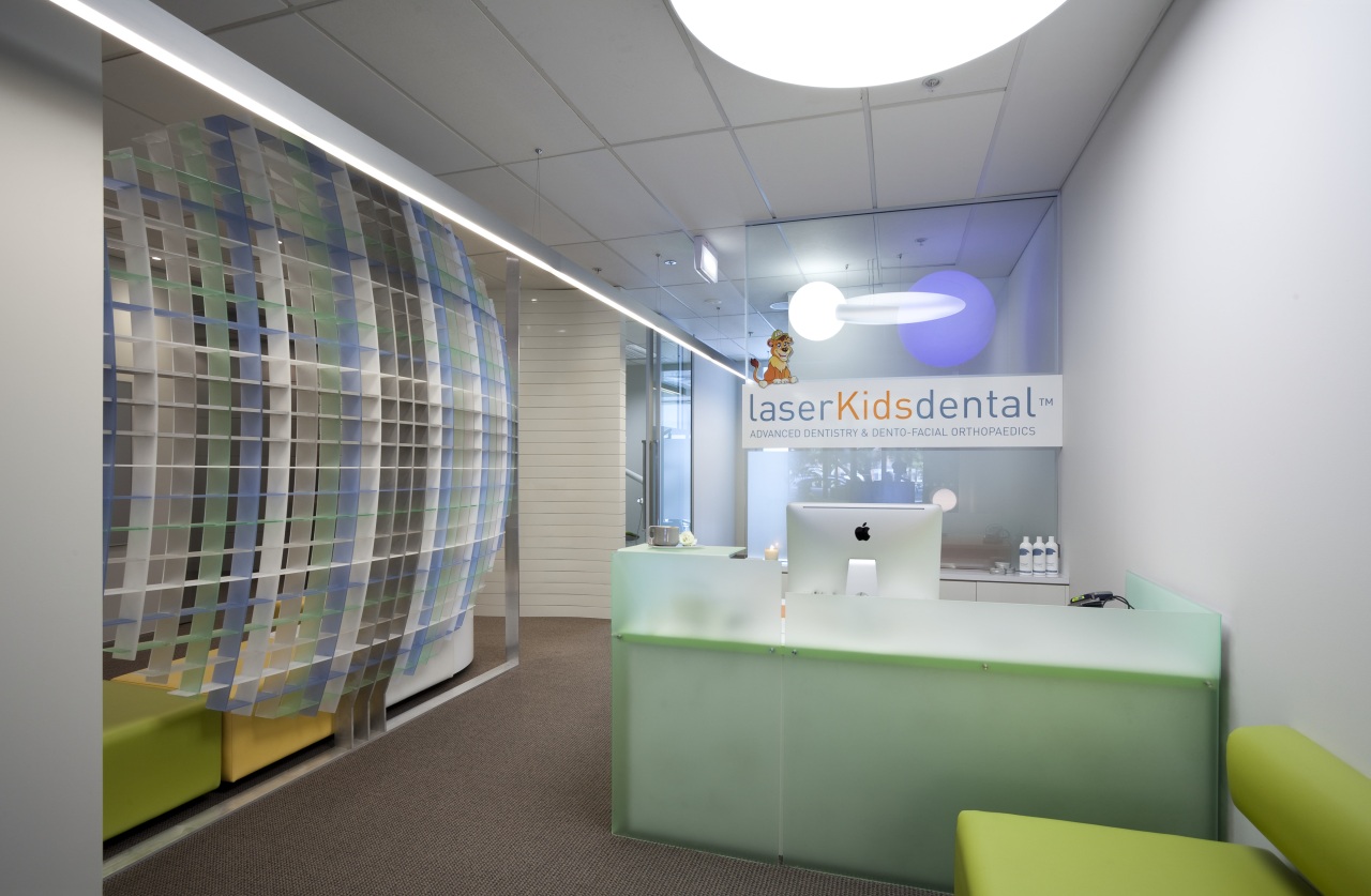 View of waiting room with green front desk. architecture, ceiling, interior design, office, product design, gray