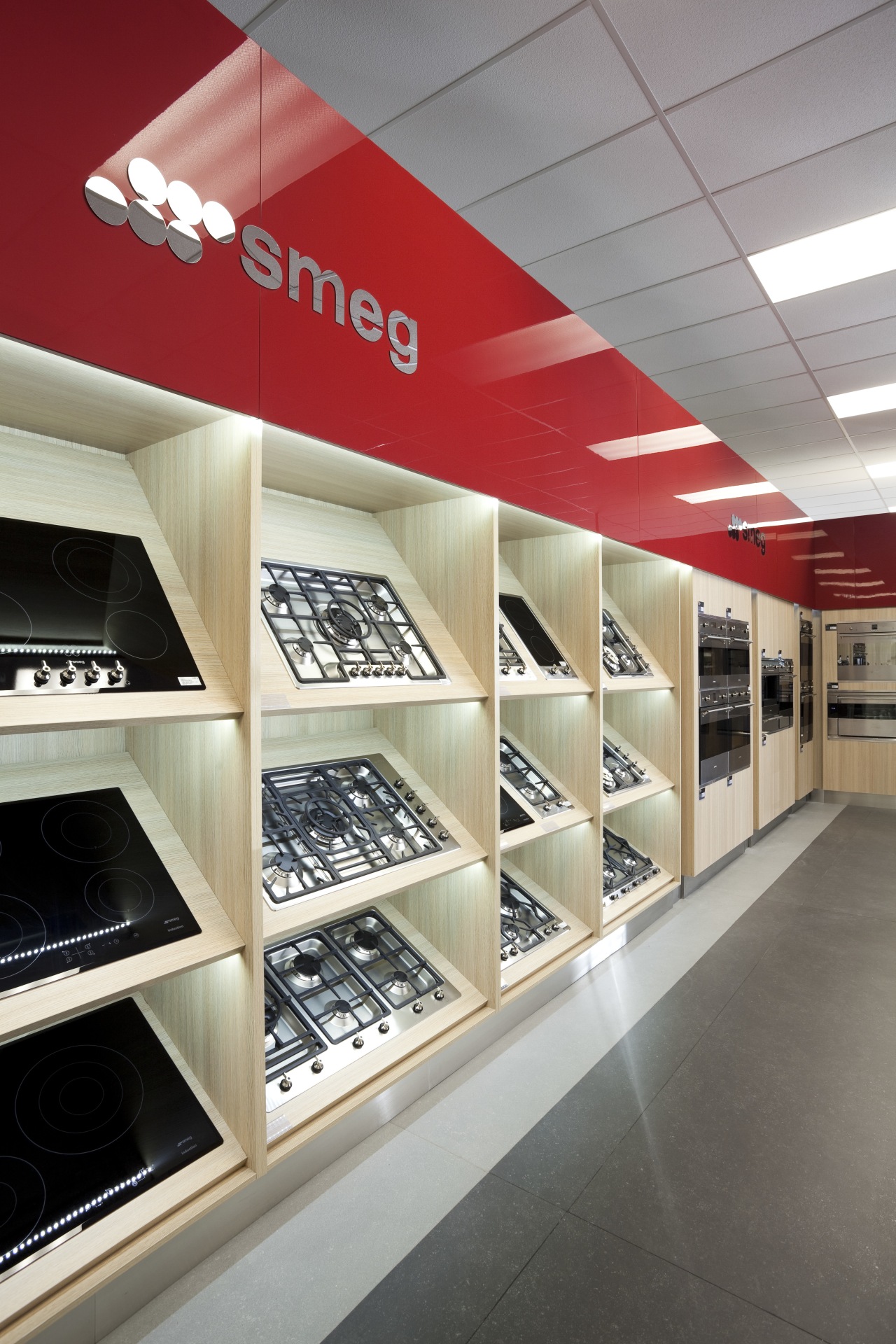 View of Smeg retail display at Kitchen Things. ceiling, display case, interior design, product design, retail, shelving, shoe store, gray