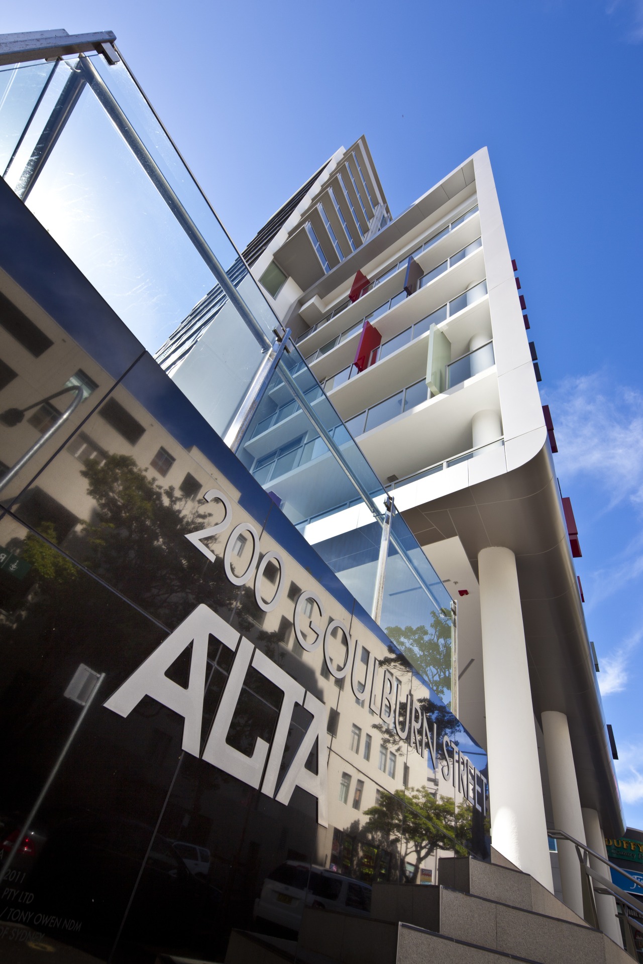 exterior of Alta apartments, sydney apartment, architecture, building, commercial building, condominium, corporate headquarters, daytime, facade, metropolitan area, mixed use, real estate, sky, black