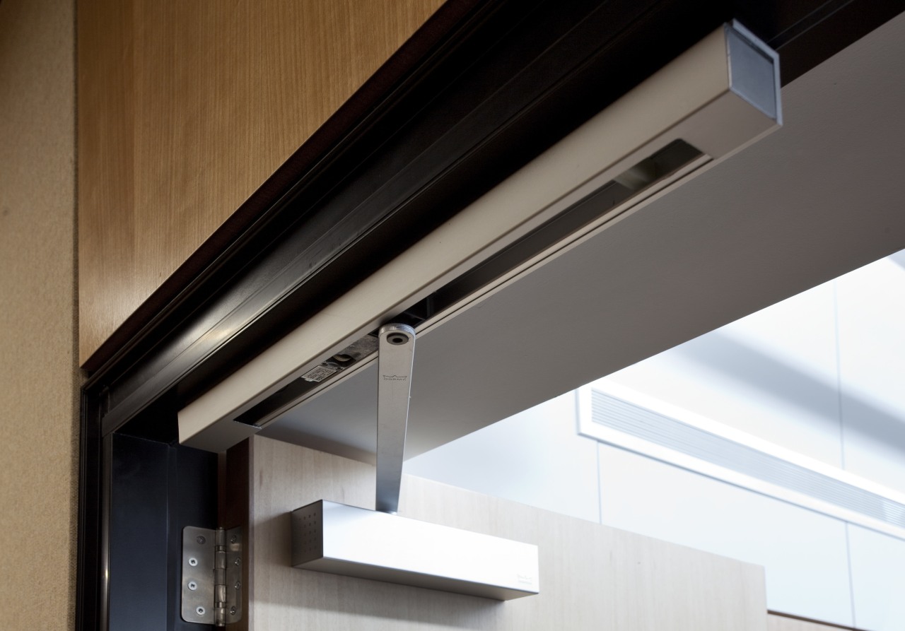 Close up of door opening system. architecture, daylighting, glass, product design, window, white, black