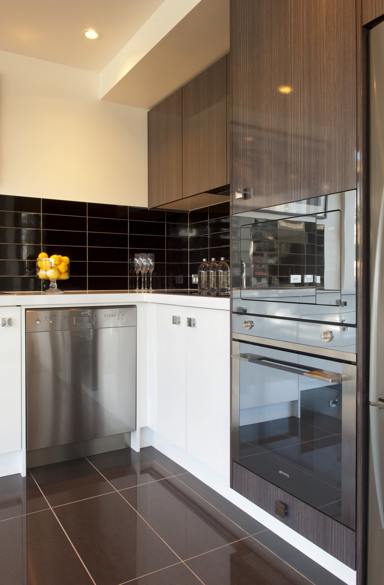 Kitchen with brown tiled flooring, stainless dishwasher and cabinetry, countertop, cuisine classique, flooring, home appliance, interior design, kitchen, kitchen stove, major appliance, room