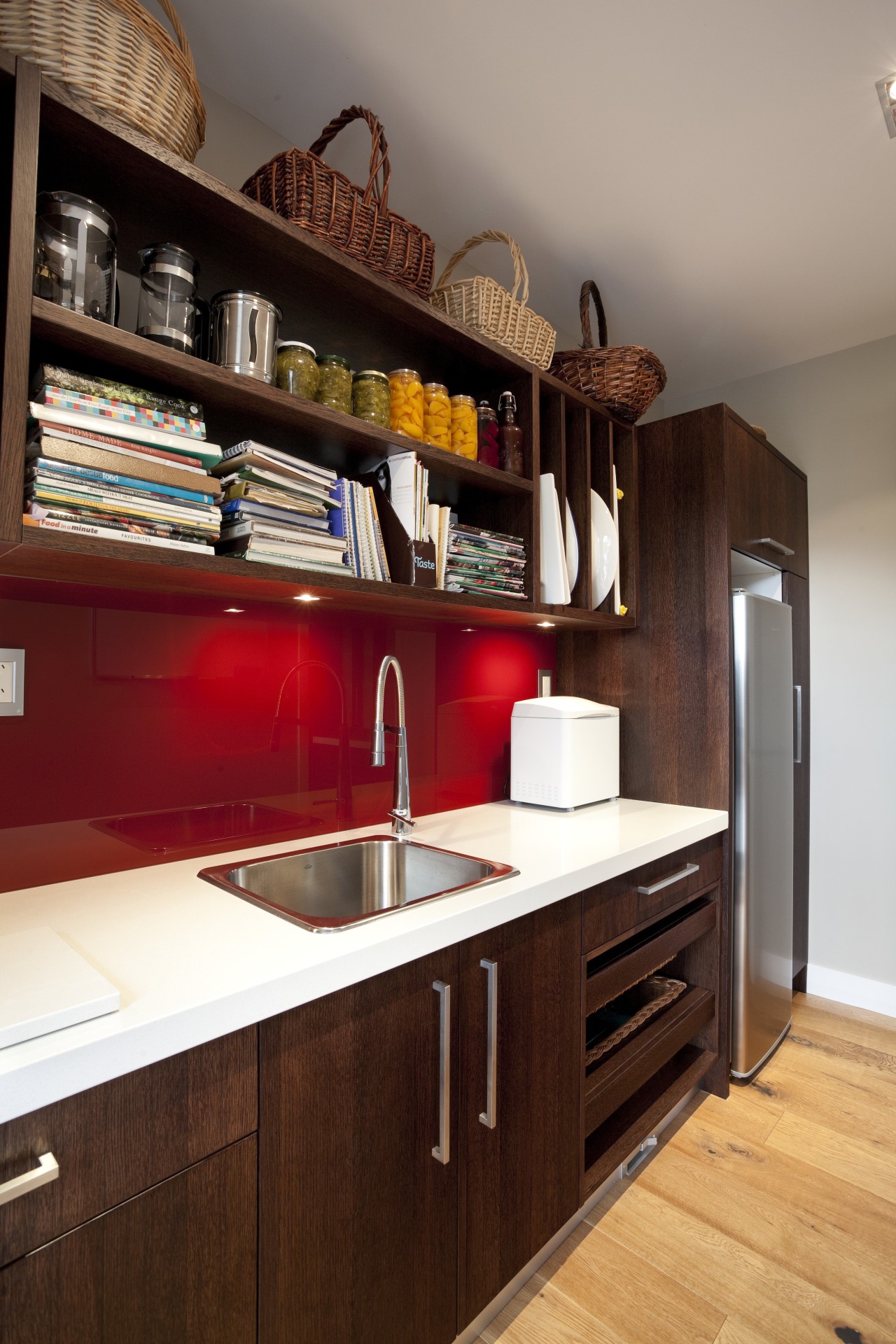 dark wooden cabinetry, white countertop, red splashback cabinetry, countertop, cuisine classique, interior design, kitchen, room, shelf, wood, red, gray