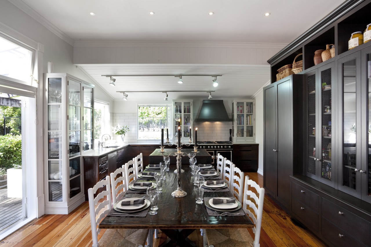 long dining table surrounded by white chairs, wooden countertop, dining room, interior design, kitchen, real estate, room, gray, black