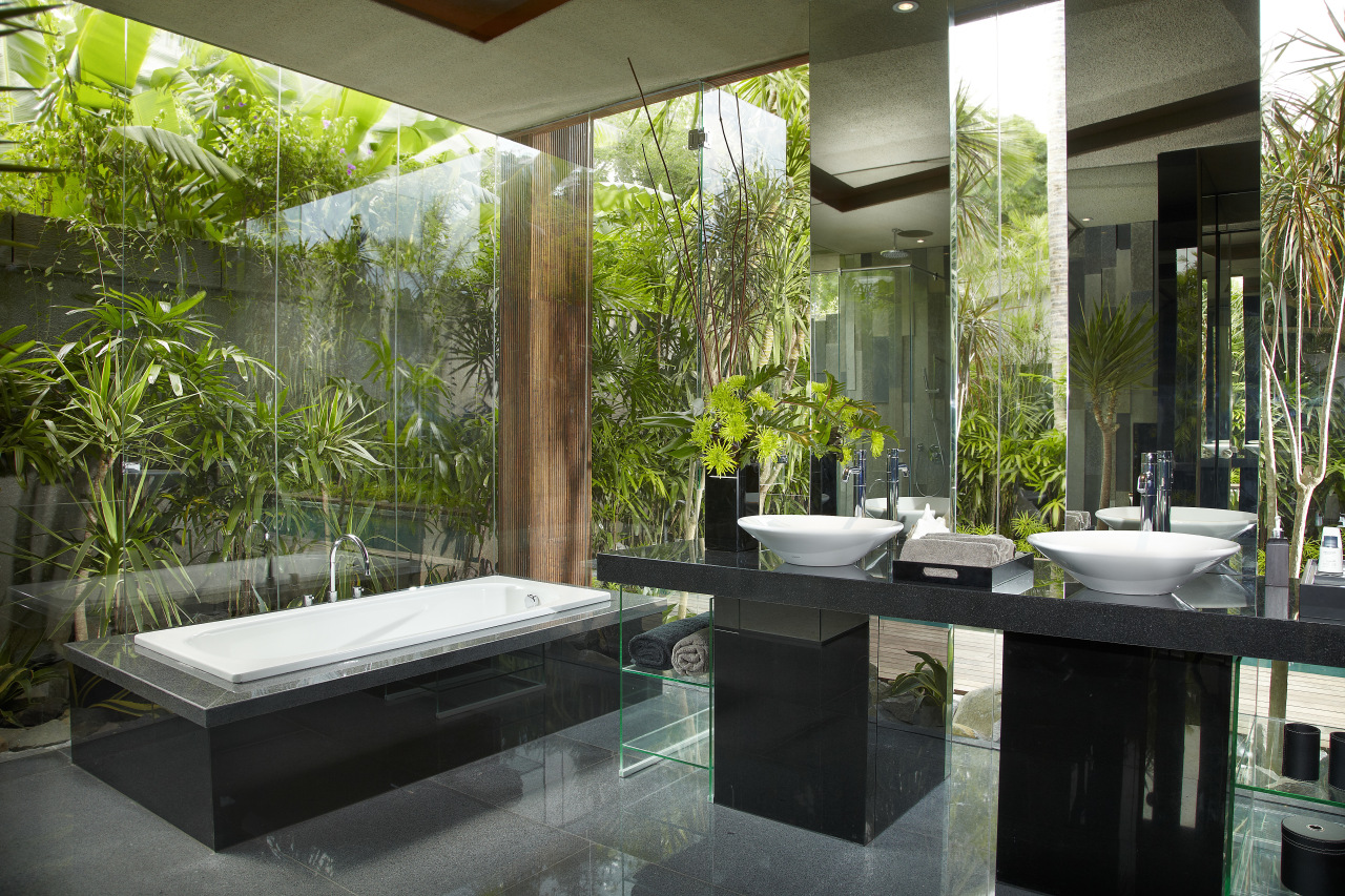 Floor-to-ceiling glass opens up this bathroom to the interior design, brown