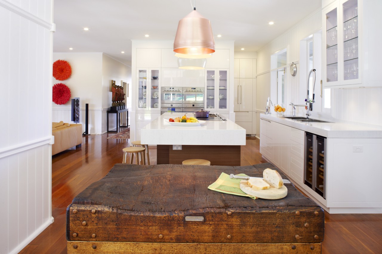 This renovated kitchen by Lynn Malone easily mixes countertop, floor, flooring, home, interior design, kitchen, real estate, room, wood flooring, white