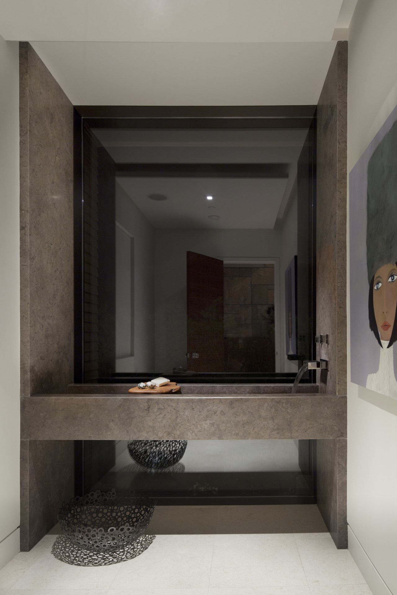 This is a home that was designed by bathroom, floor, interior design, room, gray, black