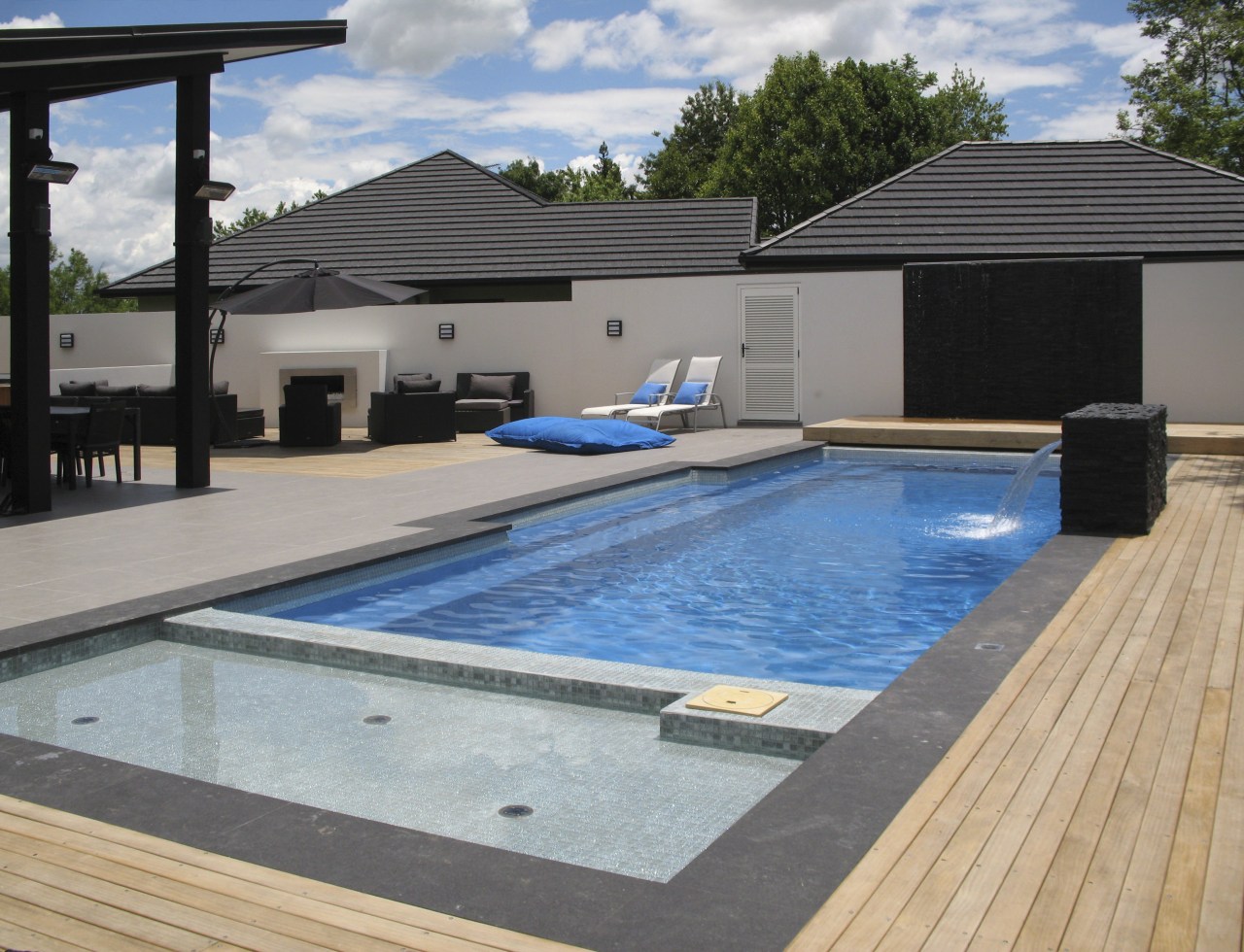 Overlook of pool with chairs. house, leisure, property, real estate, roof, swimming pool, water, gray