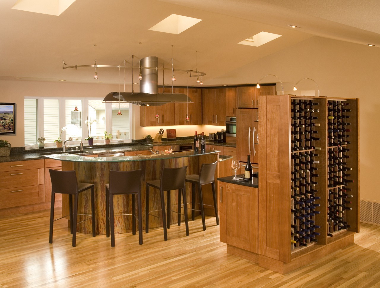 A view of a kitchen designed by Richard cabinetry, countertop, dining room, floor, flooring, hardwood, interior design, kitchen, laminate flooring, room, wood, wood flooring, orange, brown