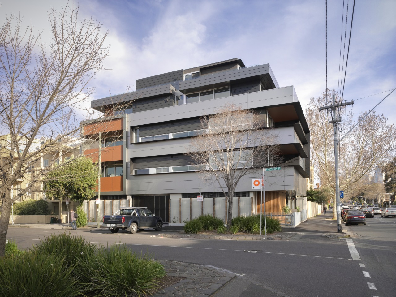 This apartment building, The Rolo, was designed to apartment, architecture, building, commercial building, condominium, corporate headquarters, facade, home, house, metropolitan area, mixed use, neighbourhood, property, real estate, residential area, suburb, tower block, gray