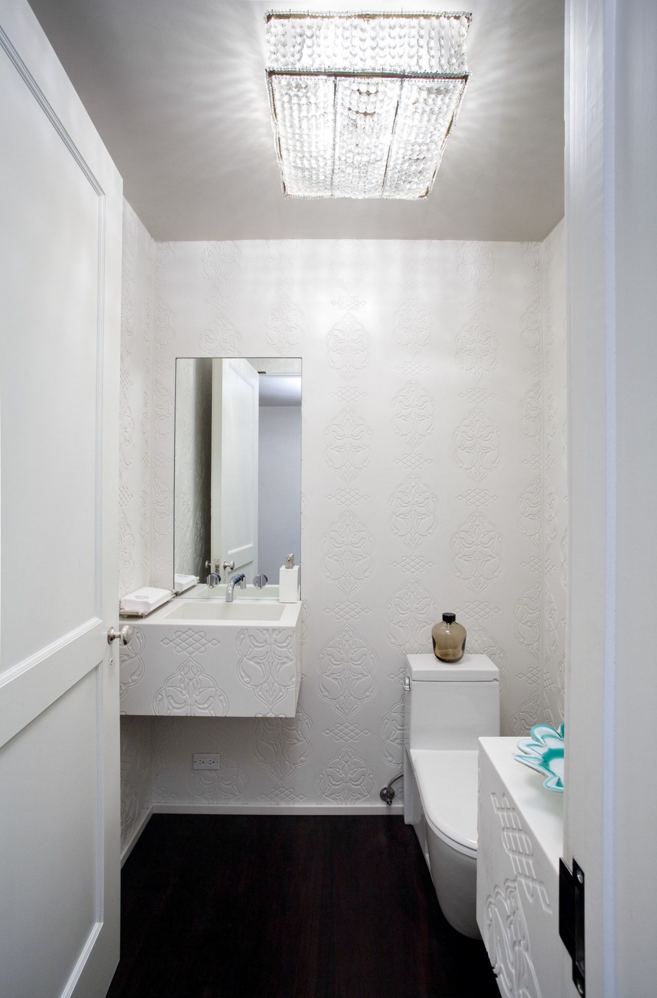 New powder room features computer-etched wall panels with architecture, bathroom, ceiling, daylighting, floor, home, house, interior design, plumbing fixture, real estate, room, sink, white, gray