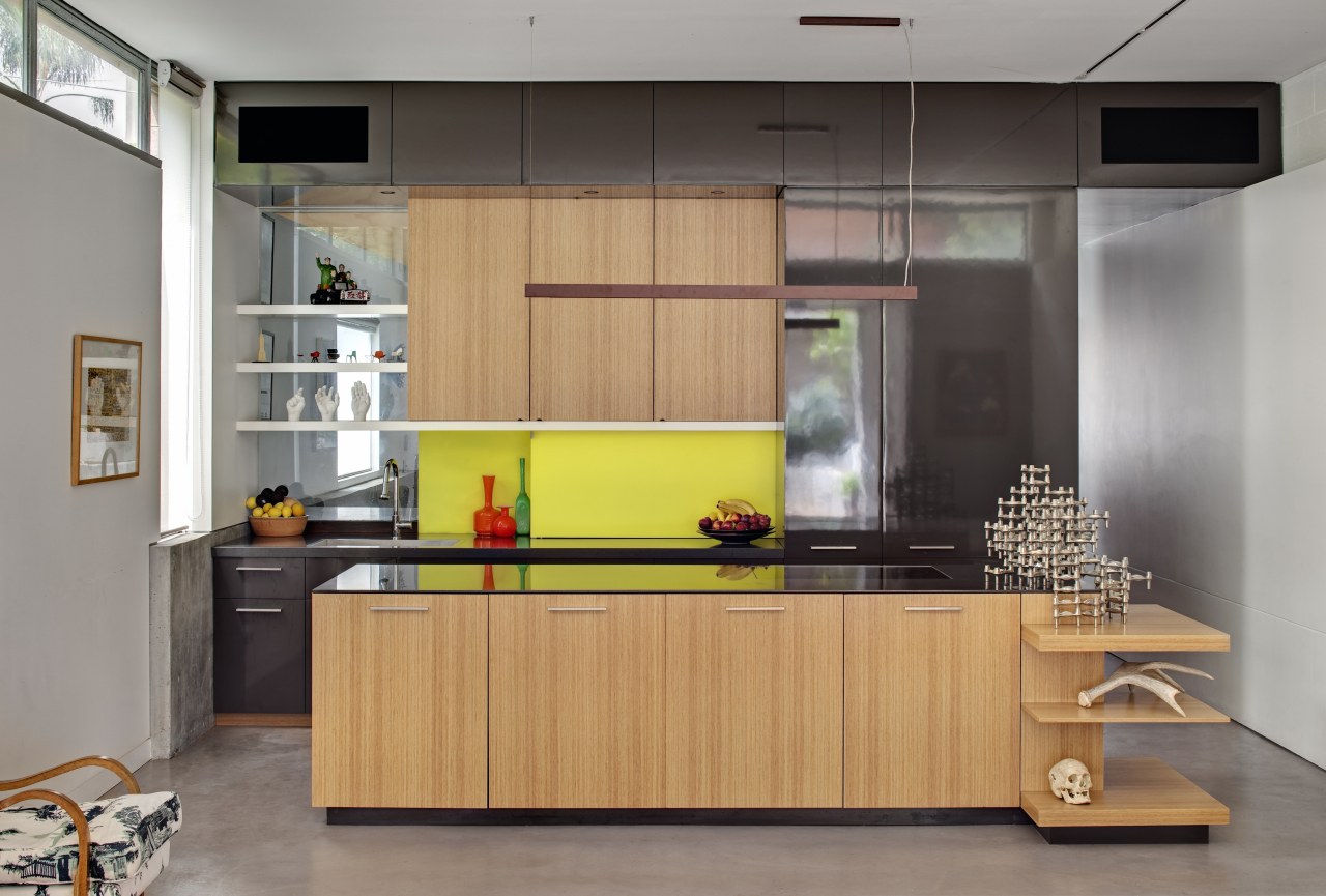 Above left: A vibrant yellow splashback provides a cabinetry, countertop, furniture, interior design, kitchen, gray