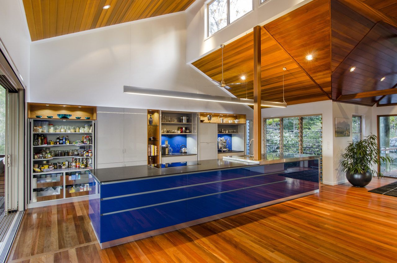 In this large family kitchen, retractable doors open ceiling, interior design, real estate, wood, brown, gray