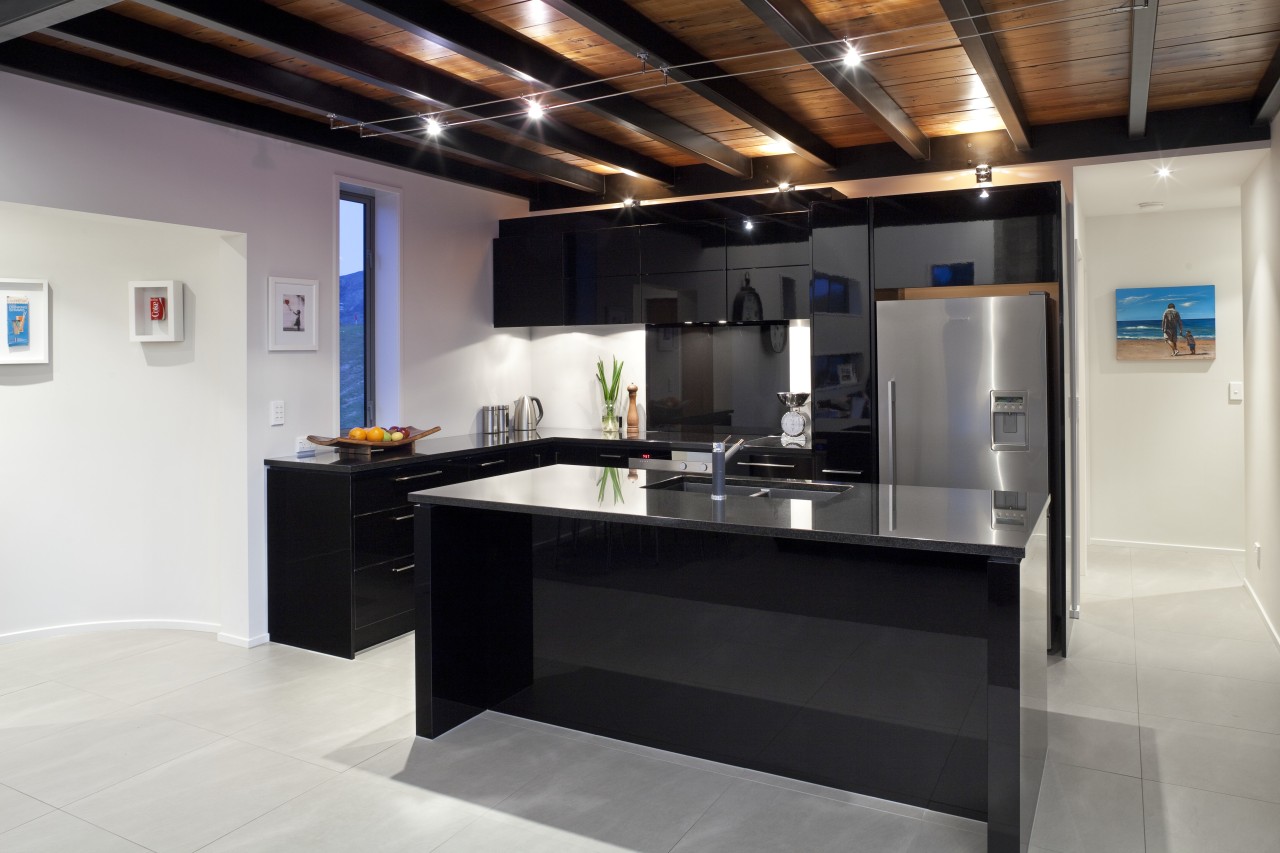 This kitchen, designed by the owner in conjunction countertop, interior design, kitchen, black, white