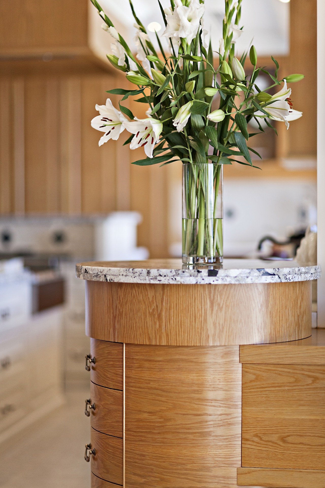 A close up view of the kitchen cabinetry flowerpot, furniture, home, interior design, table, wood, orange, brown