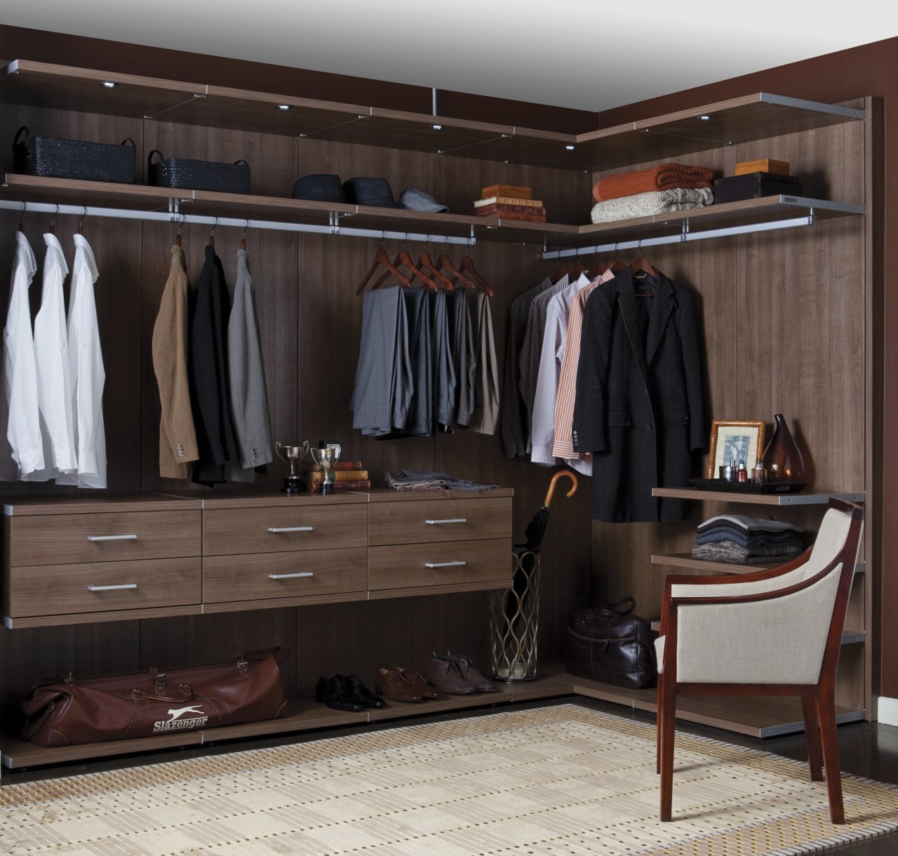 Seen here is a storage system/closet designed and closet, furniture, room, wardrobe, black, gray