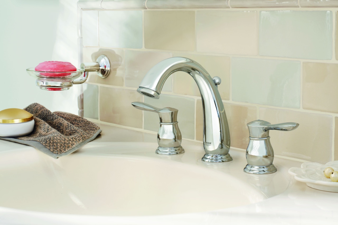 The Parkfield faucet is defined by its flowing bathroom, bathroom sink, ceramic, plumbing fixture, product design, room, sink, tap, white