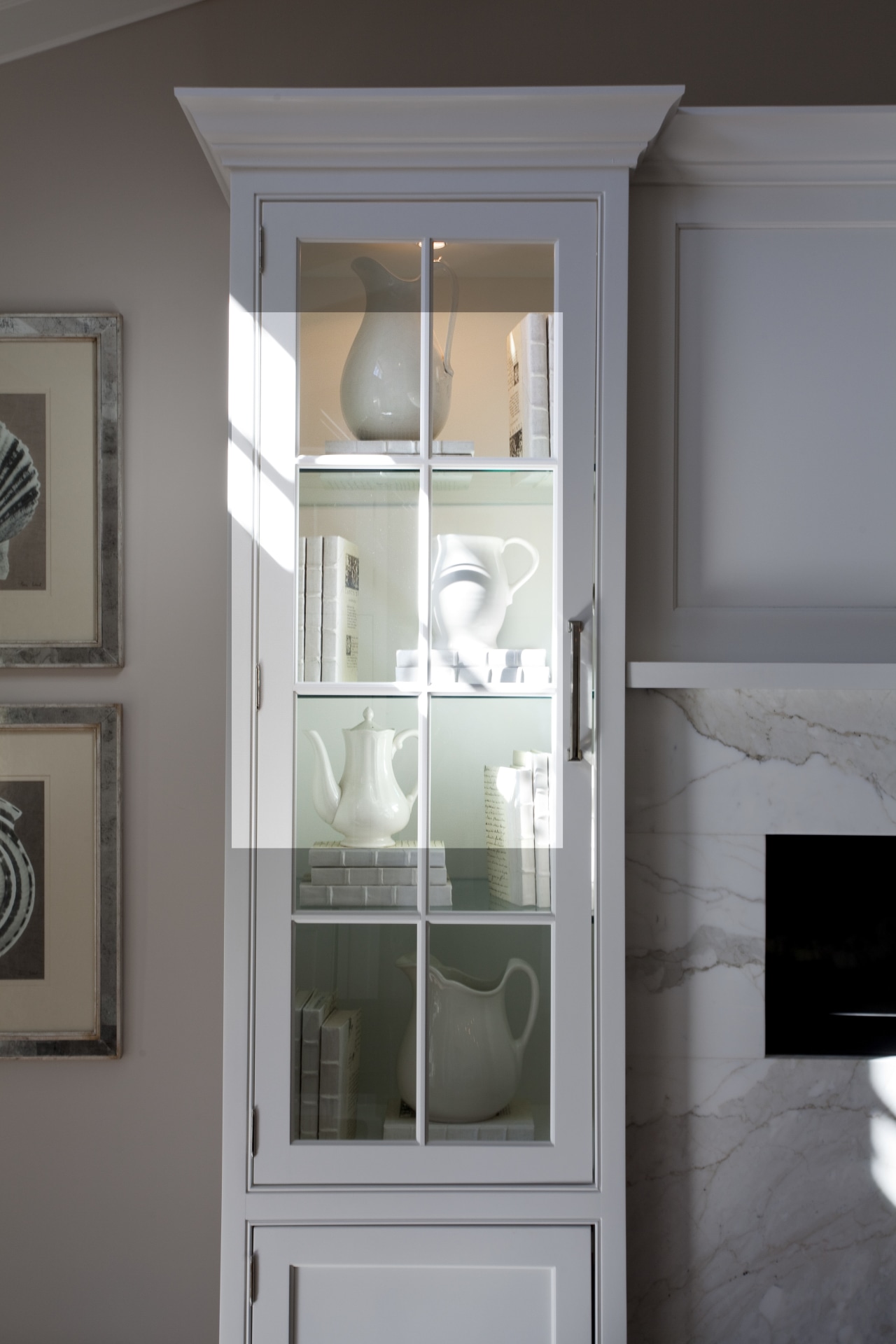 A close up view of kitchen cabinetry from cabinetry, display case, door, furniture, home, interior design, room, sash window, shelf, shelving, wall, window, gray