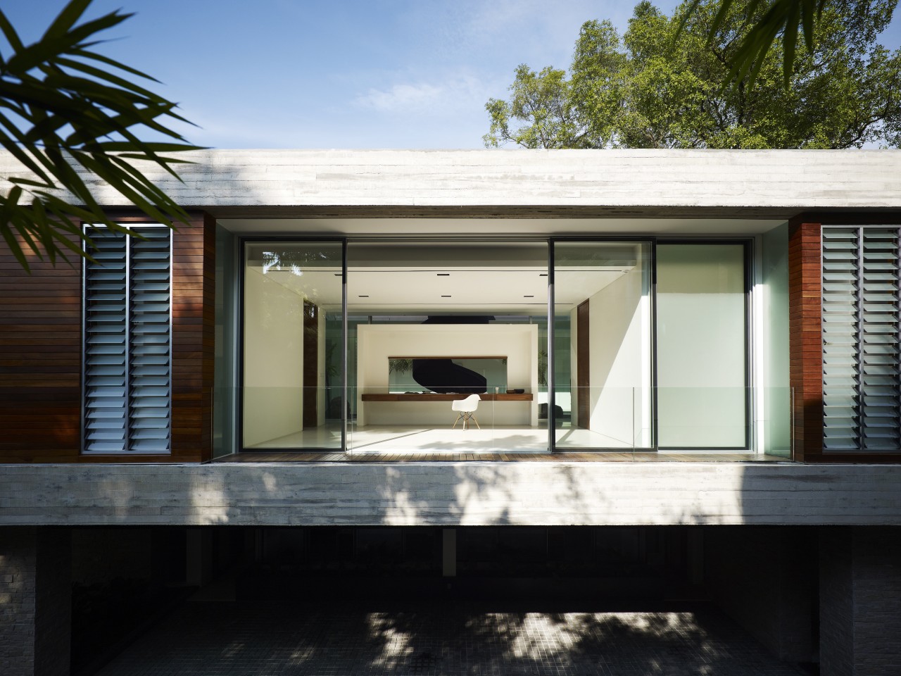 This low-lying, high-end house is by Ong Singapore architecture, facade, home, house, real estate, siding, window, black