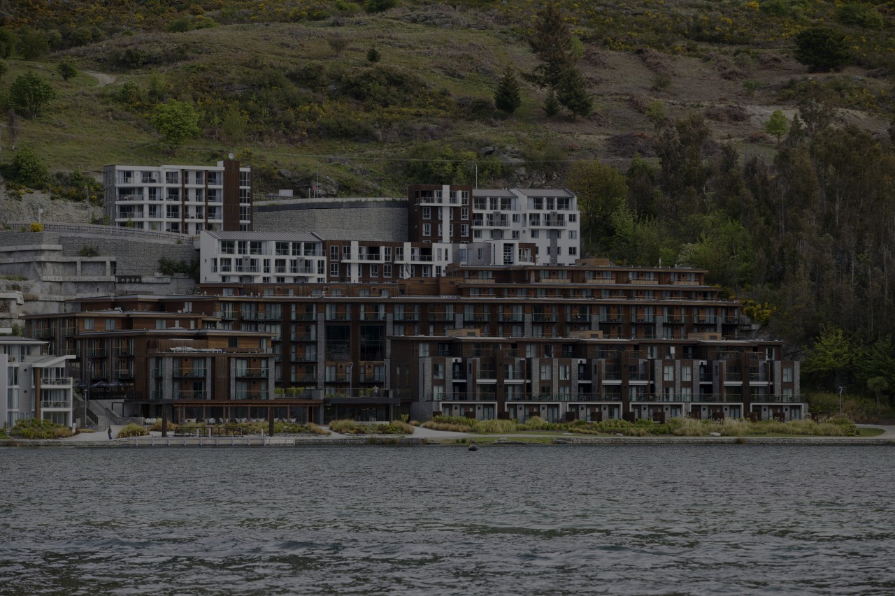 Hilton Queenstown Hotel joinery by Aluminium Systems body of water, cottage, home, house, lake, real estate, reflection, river, sky, tree, water, black