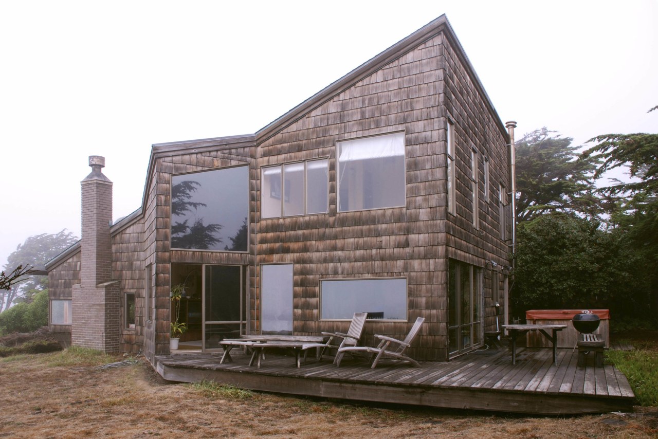 Before the remodeling, this seaside house was in architecture, building, cottage, facade, home, house, property, white, brown