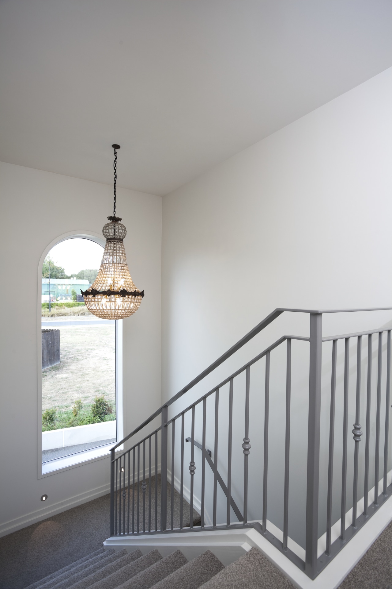 Resene Quarter Linen is one of more than architecture, baluster, ceiling, daylighting, floor, handrail, home, house, light fixture, product, stairs, wall, window, wood, gray