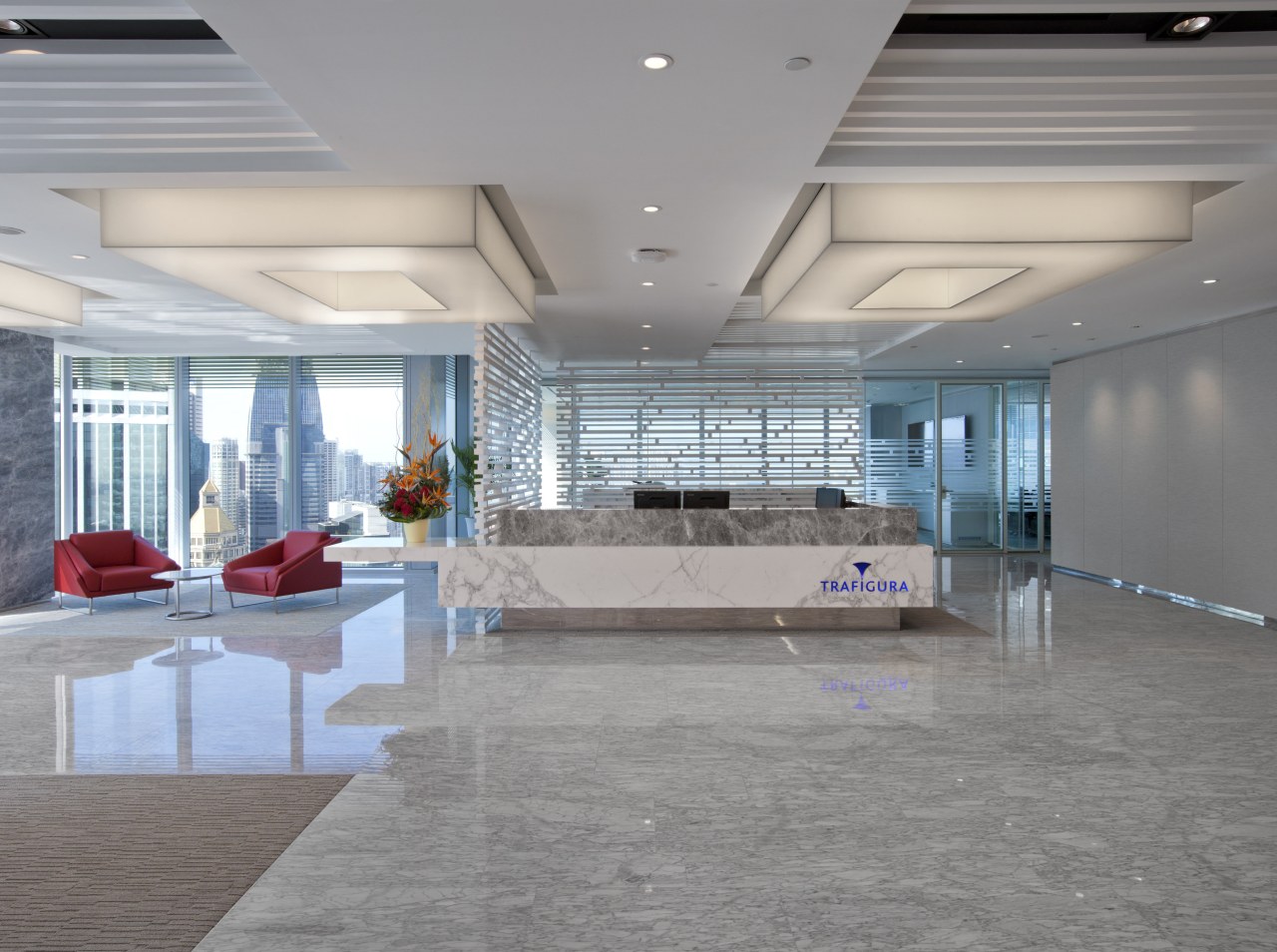 Designphase DBA evoked the standing of Trafigura through ceiling, daylighting, floor, flooring, interior design, lobby, gray