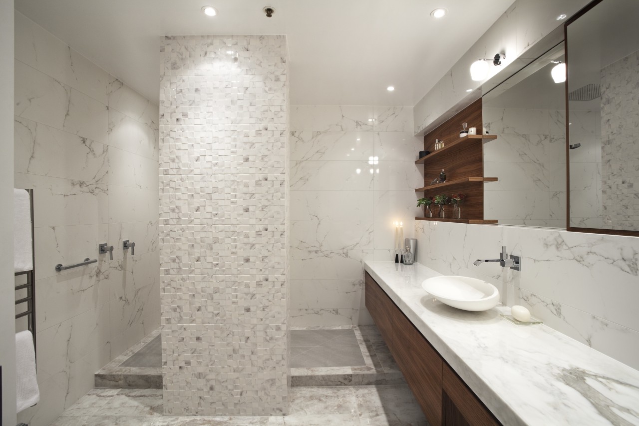 This internal bathroom in a penthouse apartment was bathroom, floor, interior design, property, room, sink, tile, gray